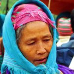 Photo of an old lady that belongs to Hmong people / Fotografija starejše gospe iz ljudstva Hmong