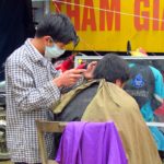 Photo of a street hairdresser / Fotografija uličnega frizerja