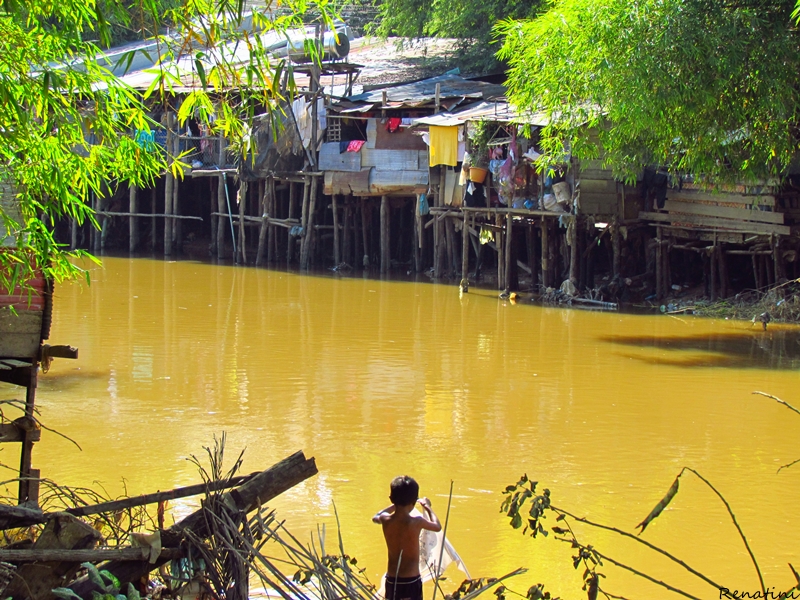 Fotografija skromnih bivališč v Siem Reapu