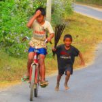 Photo of two boys playing outside / Fotografija dveh otrok med igro
